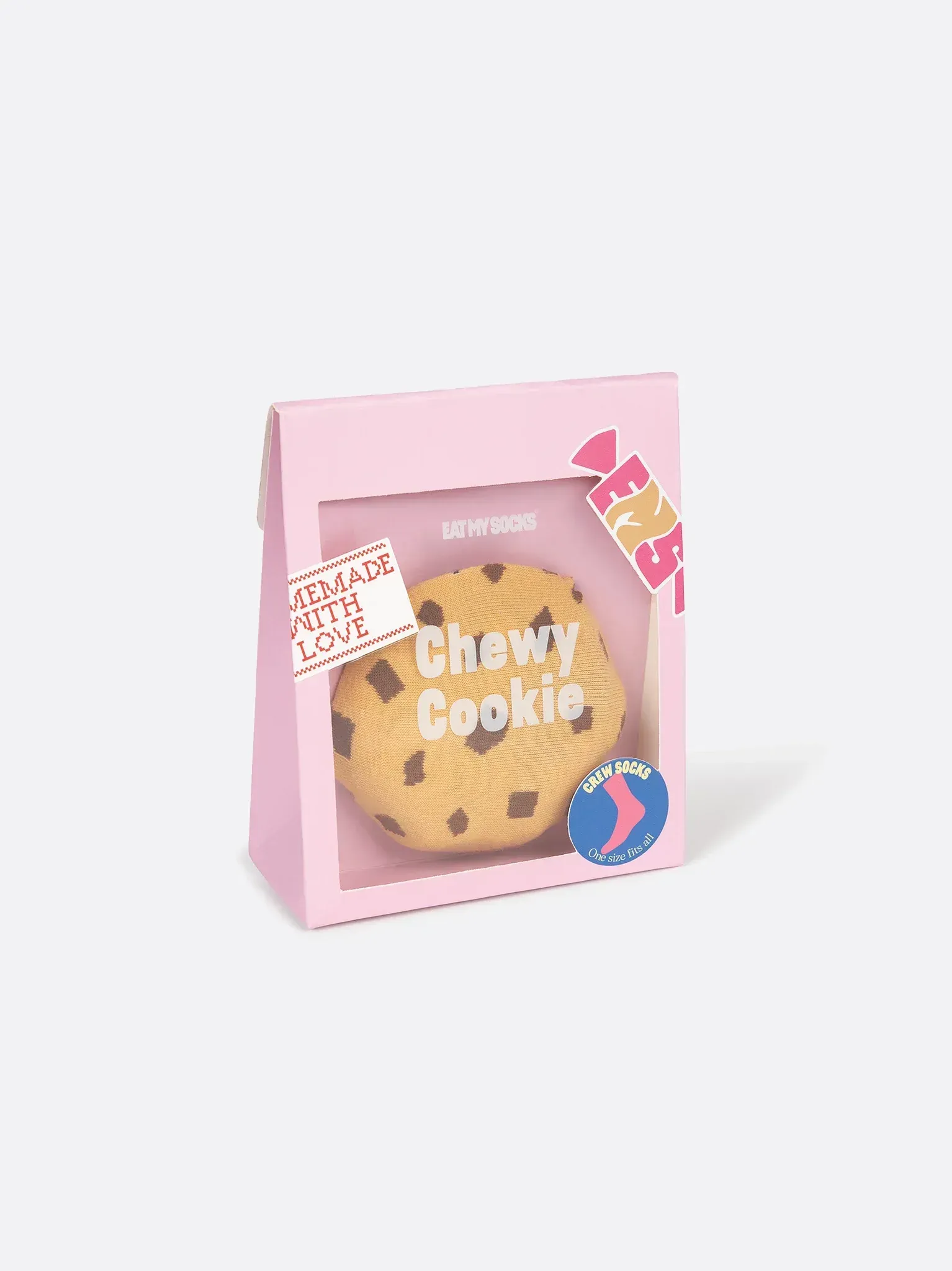 A chewy cookie is in a pink box.