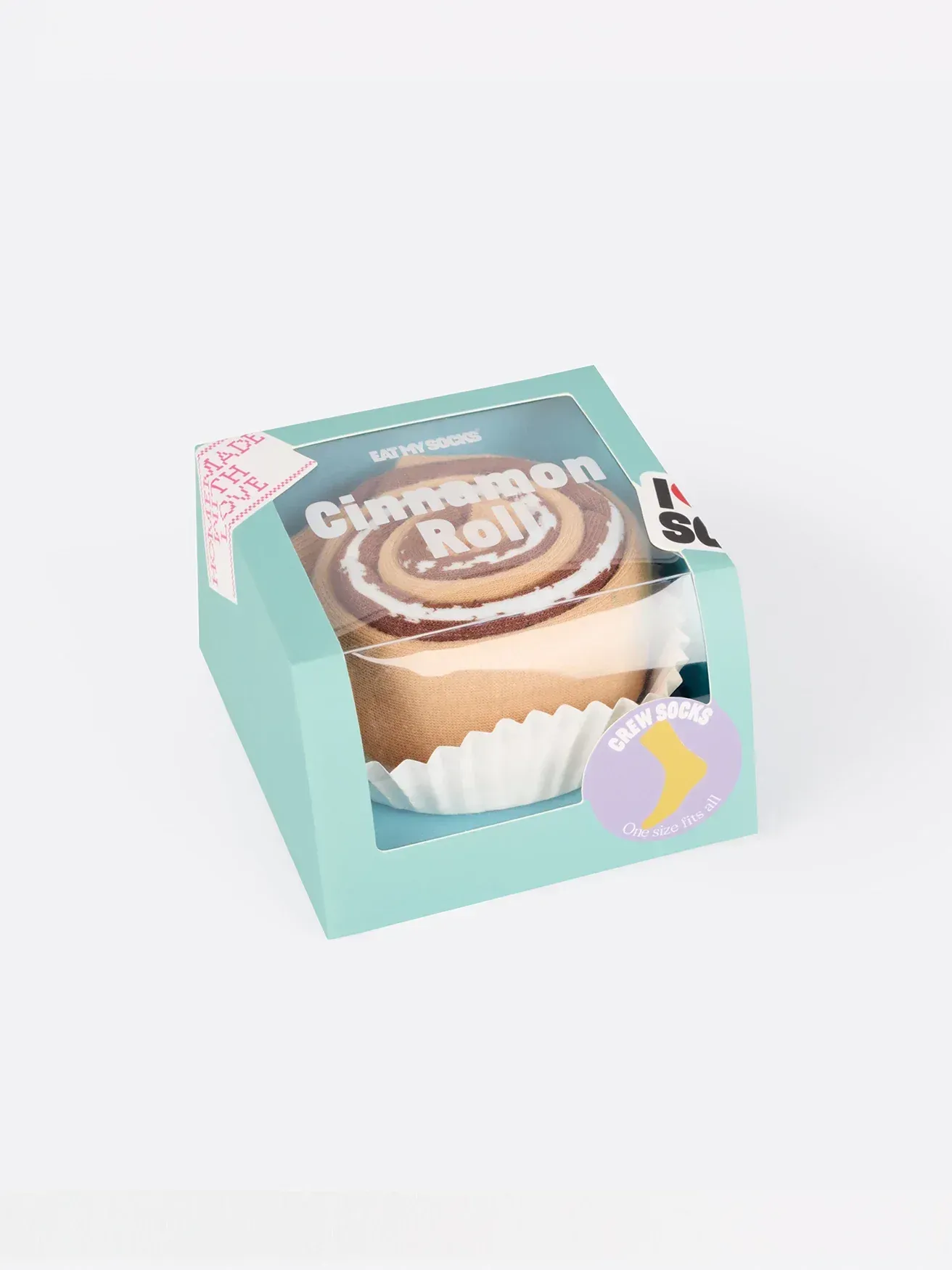 A cinnamon roll in a box on a white background.