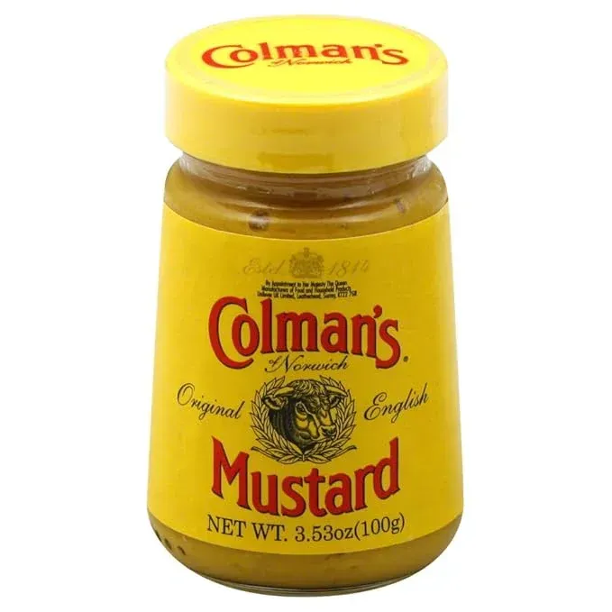 A jar of colman 's mustard with a yellow lid