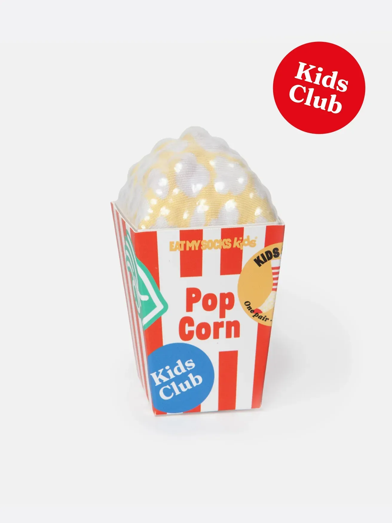 A box of popcorn that says kids club on it