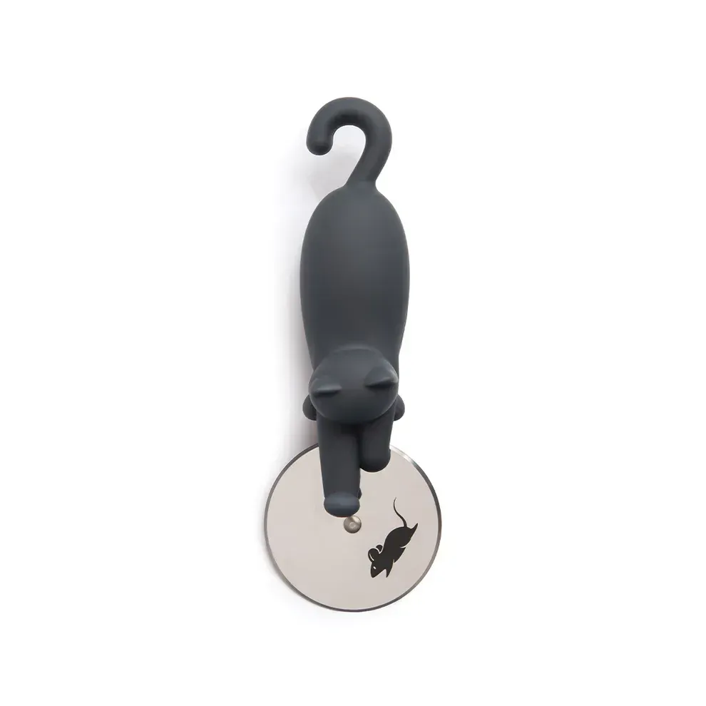 A black cat is hanging from a hook on a white background