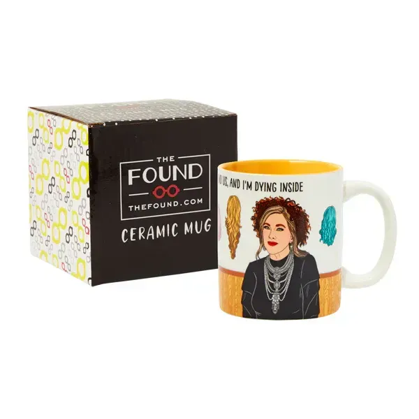 A ceramic mug with a picture of a woman on it