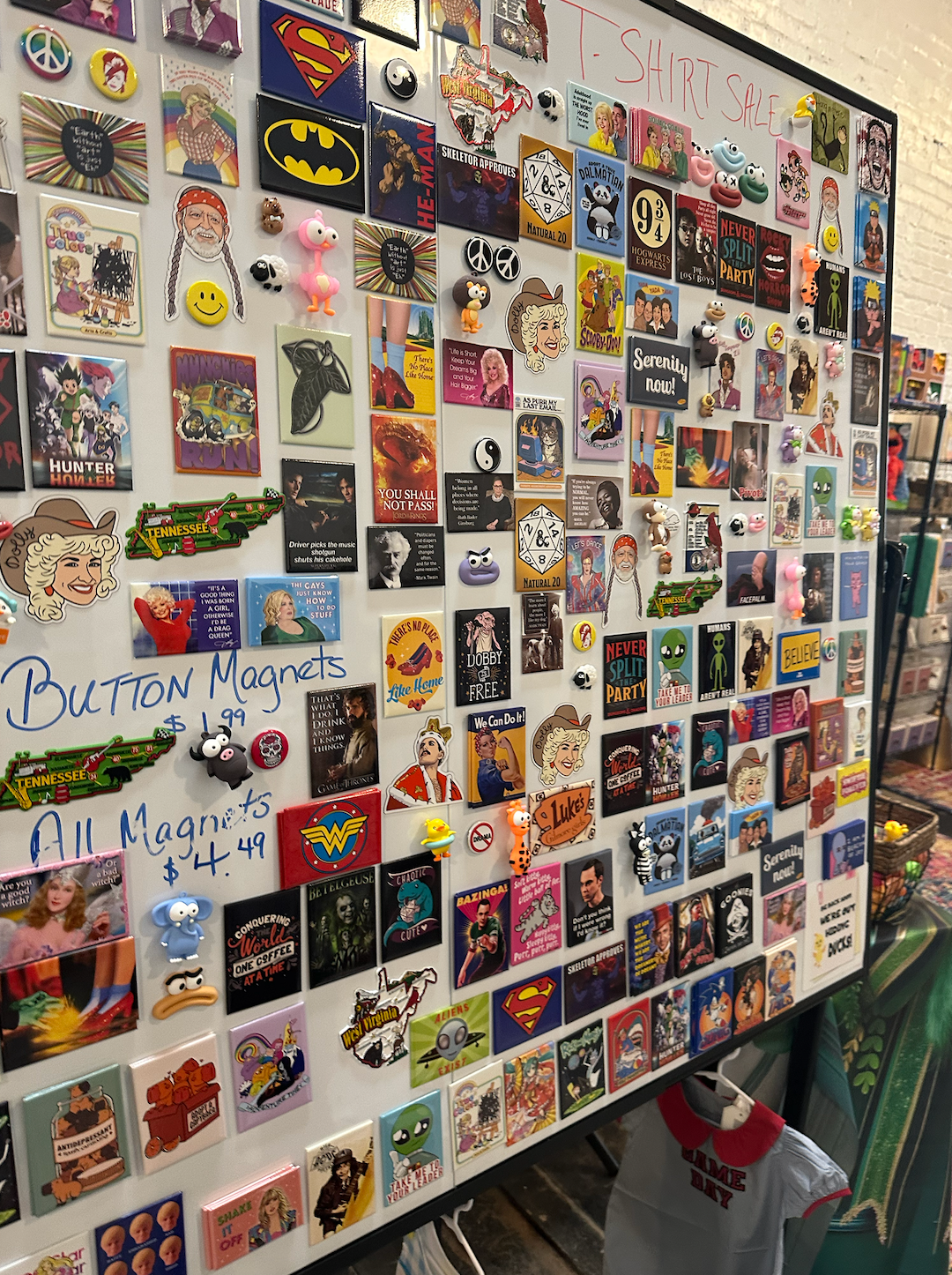 A fridge with a lot of magnets on it