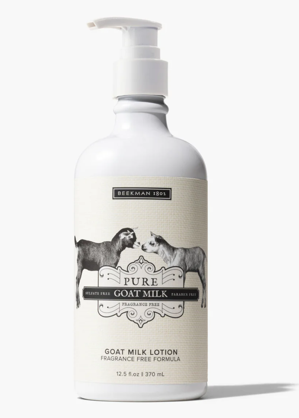 A bottle of pure goat milk lotion with two horses on the label.