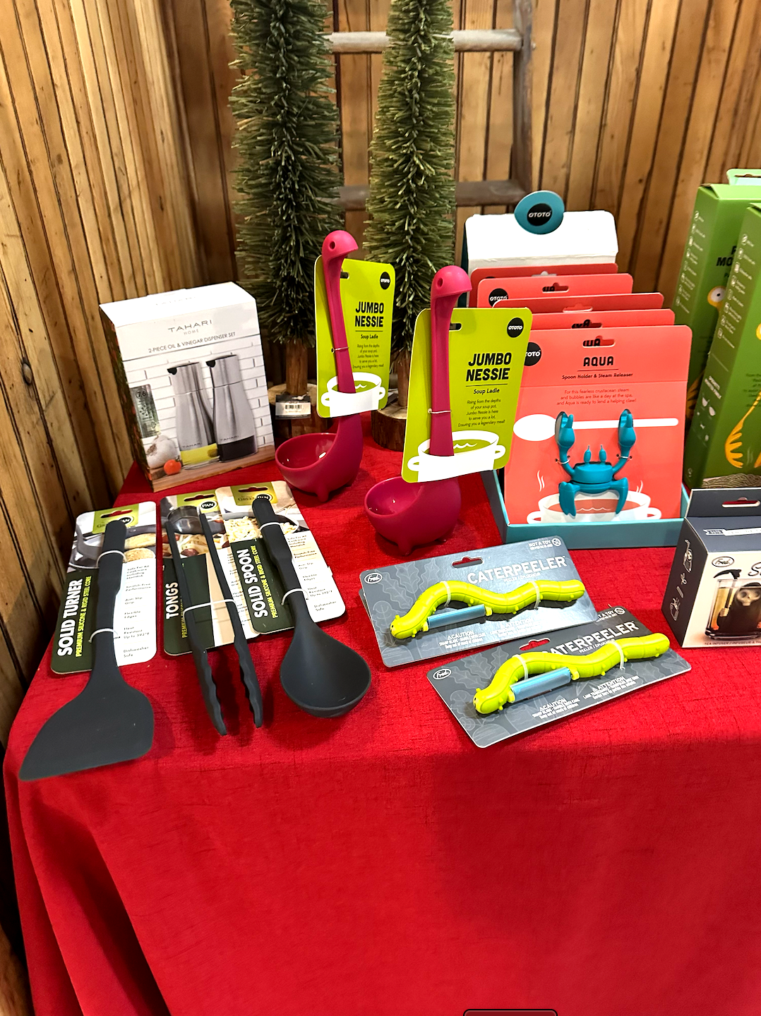 A table topped with a variety of kitchen utensils.
