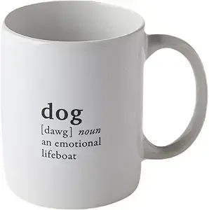 A white coffee mug with the word dog on it.