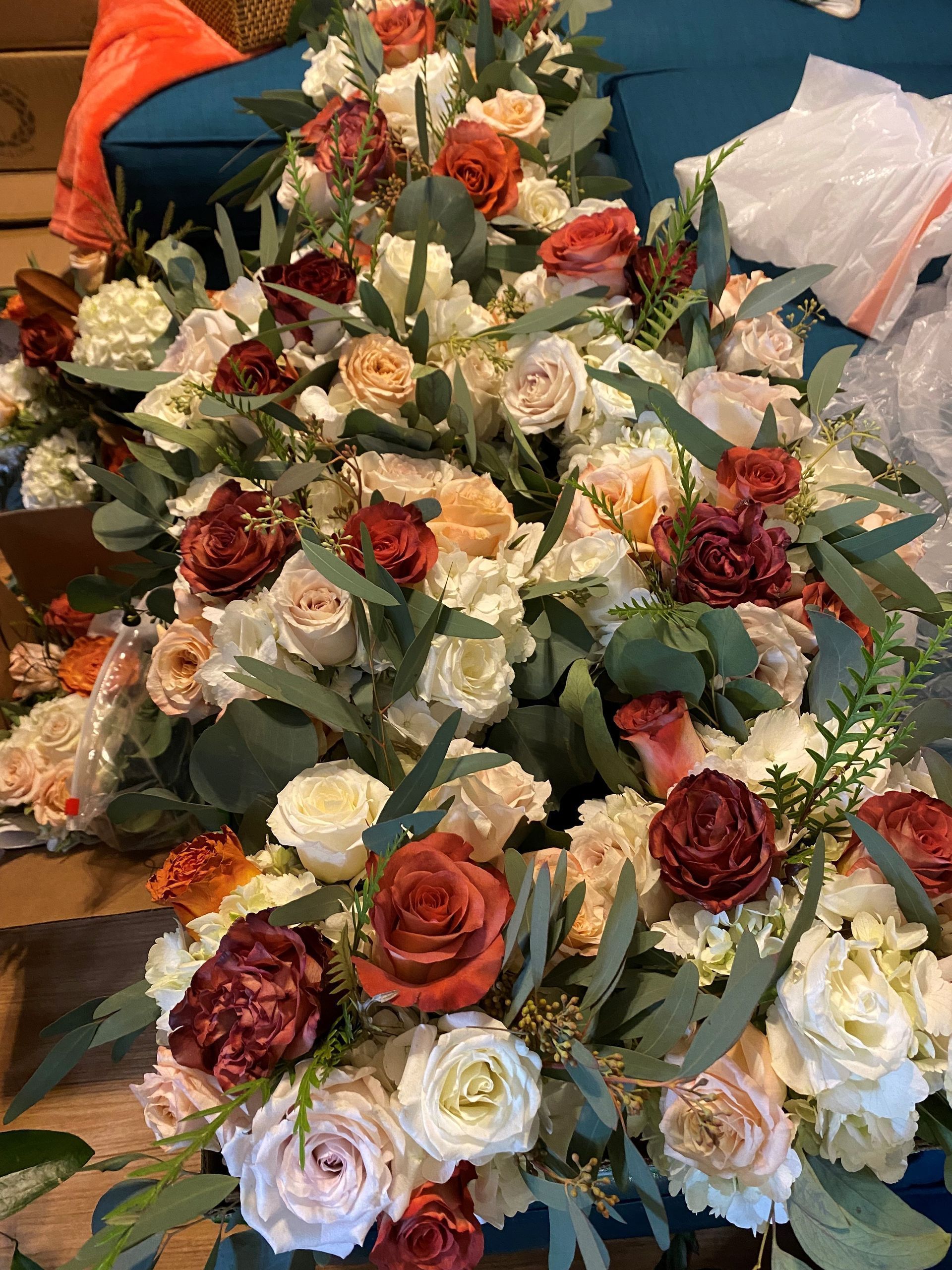a bunch of flowers are sitting on a table .