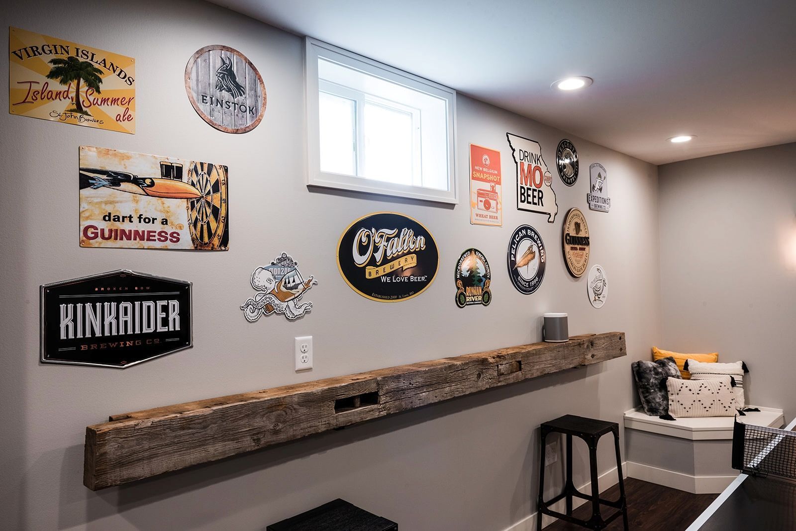 There are many signs on the wall in this room.