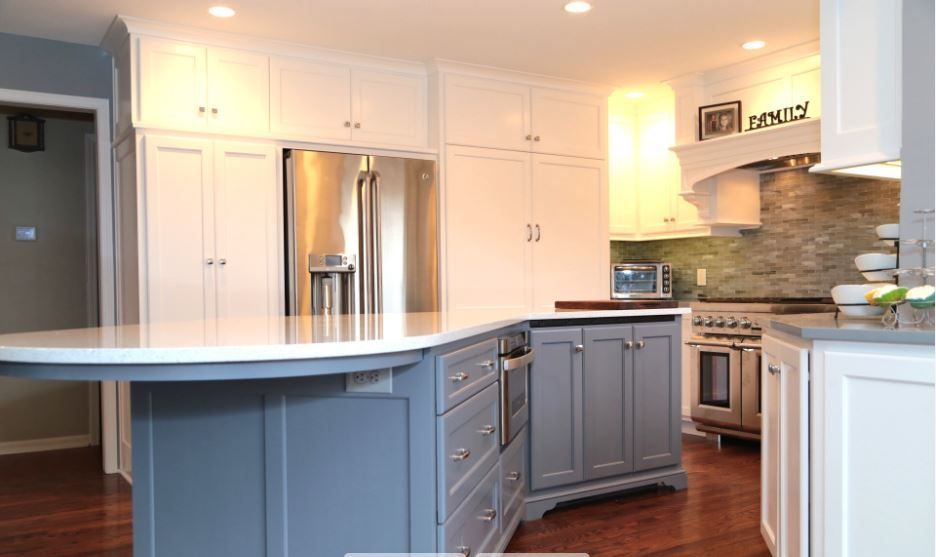 A kitchen with a large island and a sign that says family