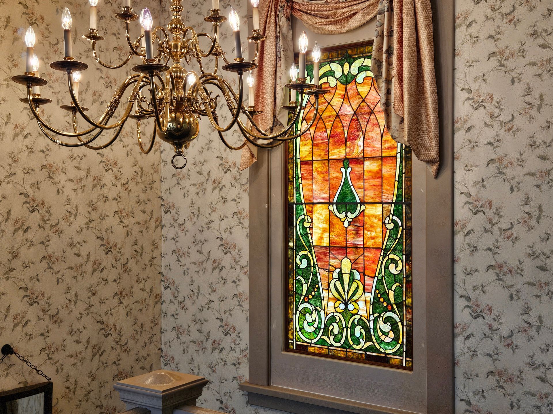 A room with a stained glass window and a chandelier