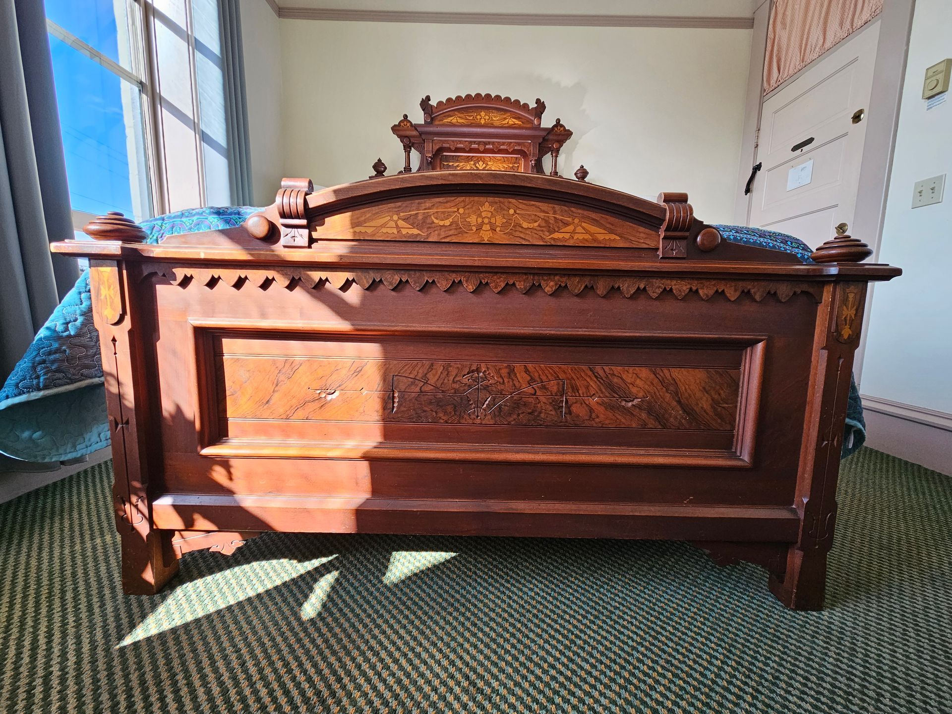 Foot board of wood carved bed. 