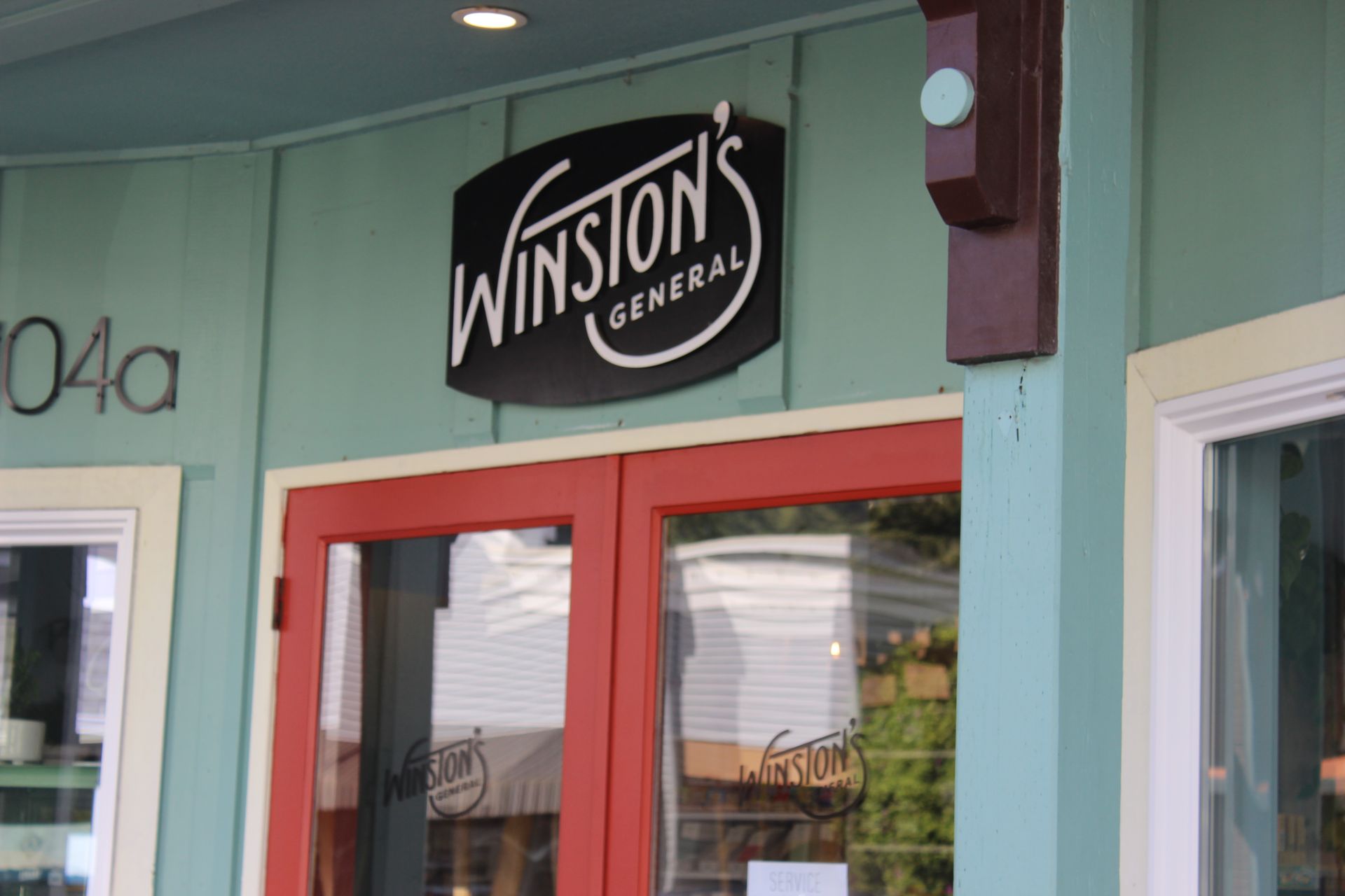 A store front with a sign that says winston 's general