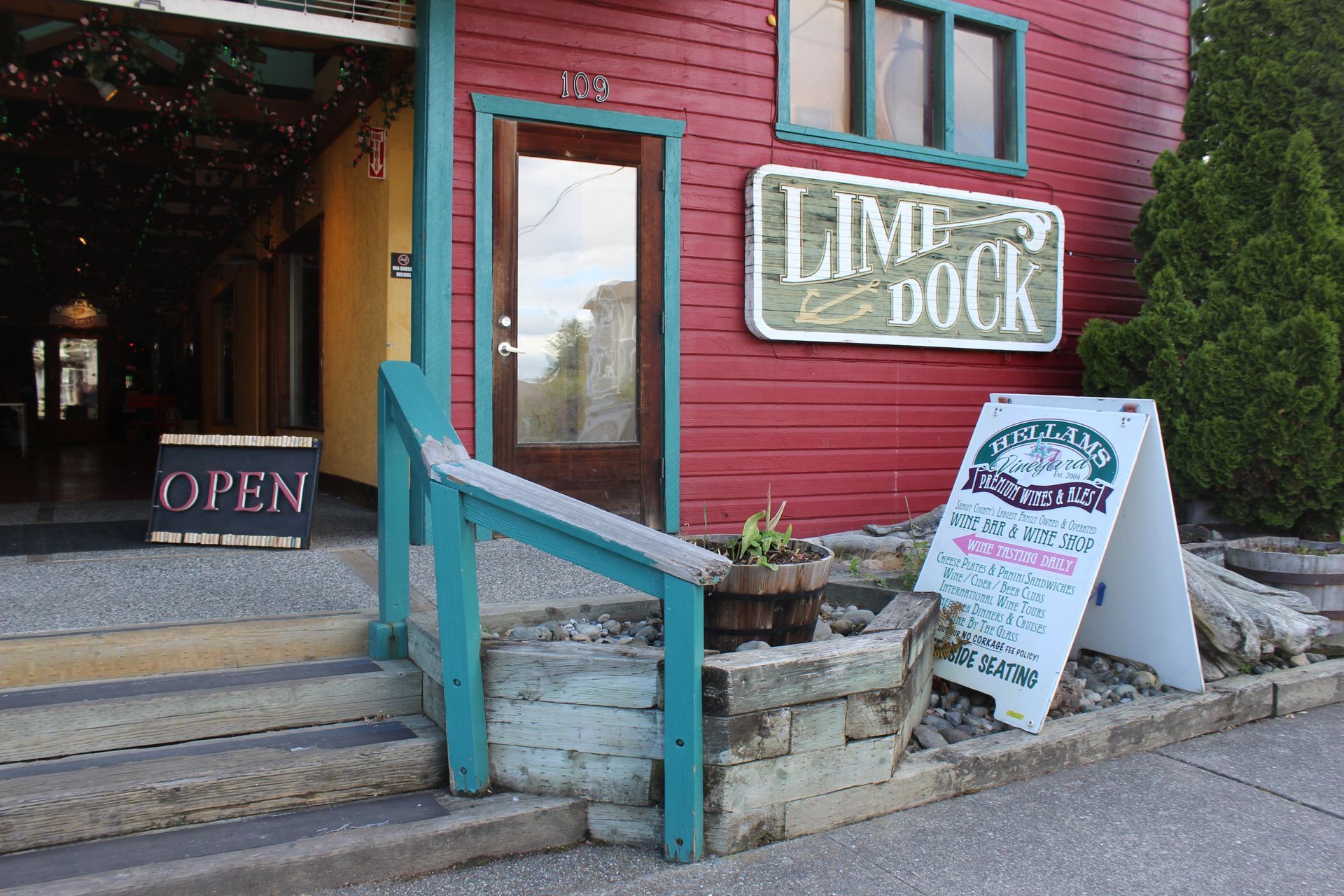 A red building with a sign that says lime dock