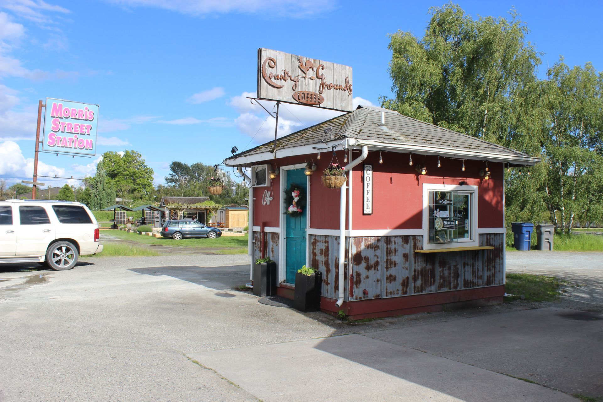 A red building with a sign that says ranch house