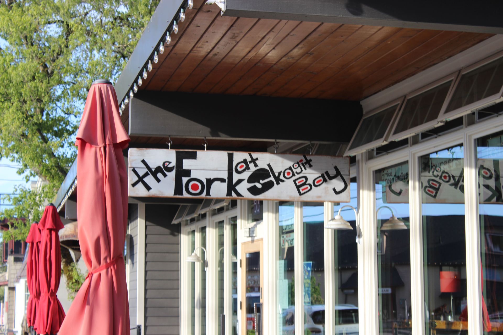 A restaurant with a sign that says the fork at kokosh bay