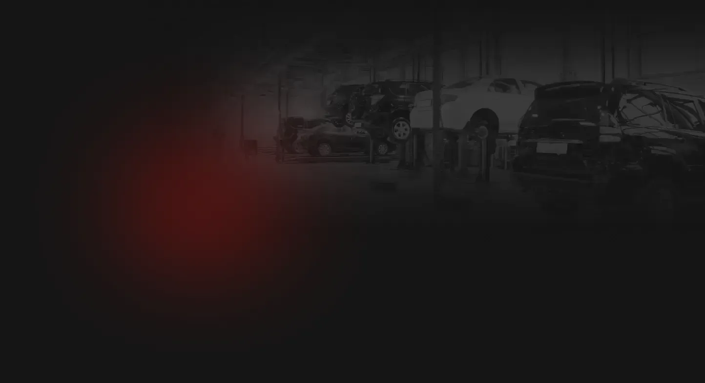 Vehicles in Garage Black and Red Background | Rux Auto Garage