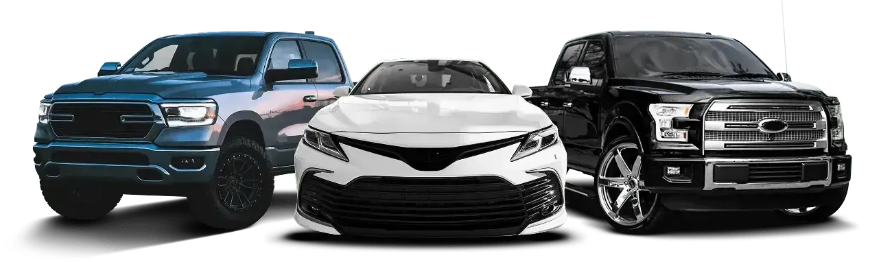 White car with gray truck on left and Black truck on right | Rux Auto Garage Inc