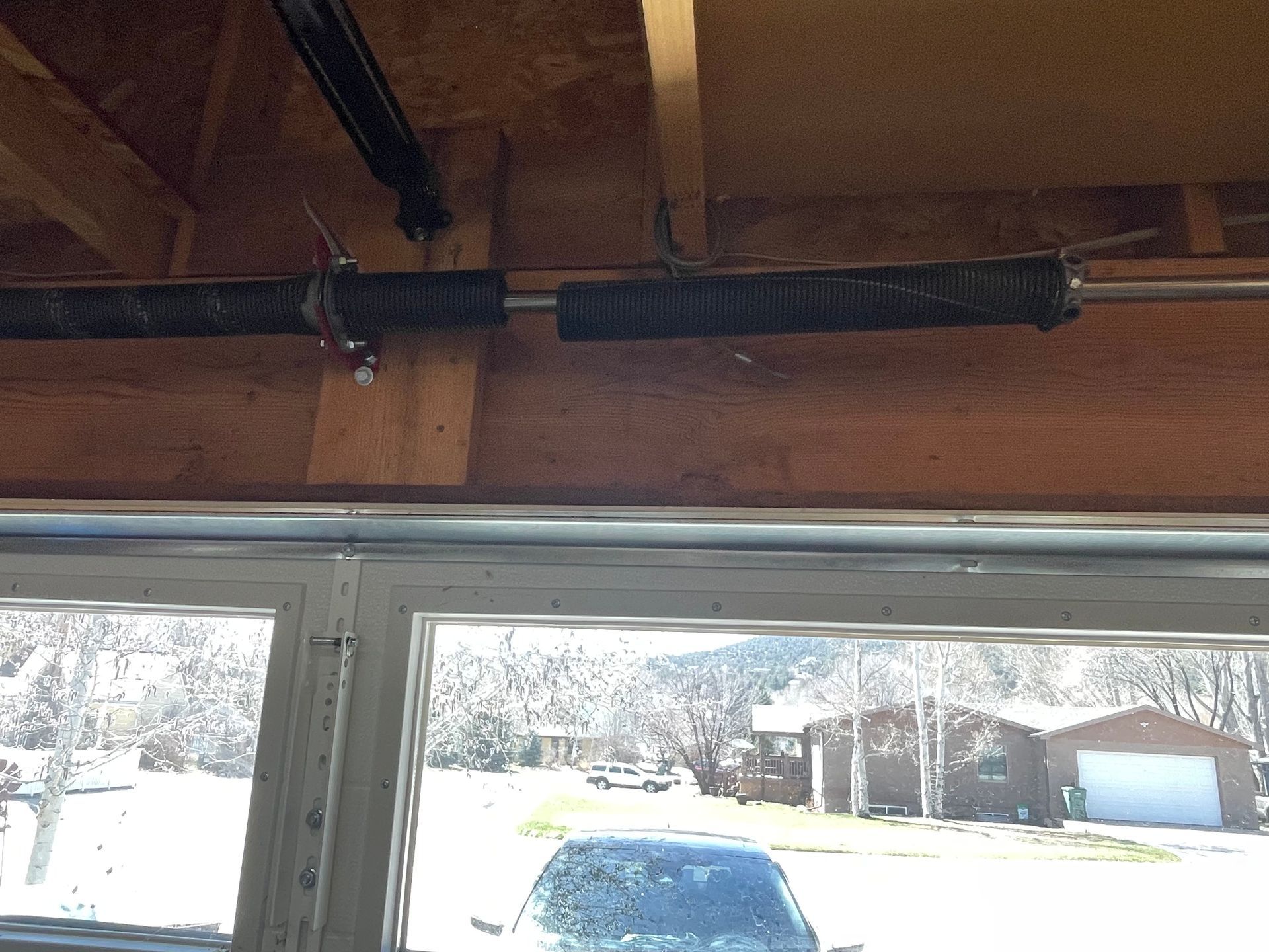 Broken Garage Door Springs — Rifle, CO — Bailey’s Garage Doors & More