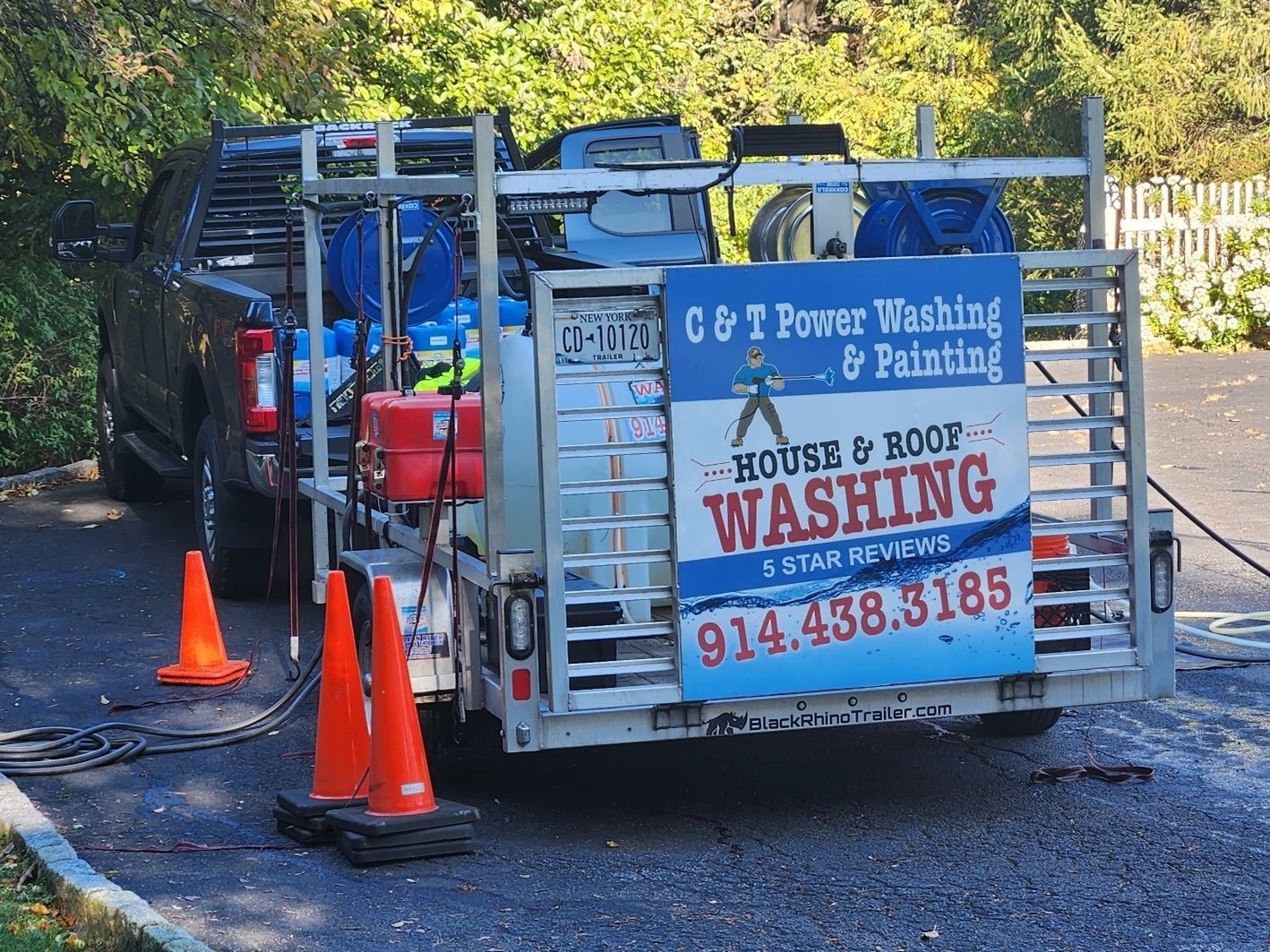 A Truck With a Sign on the Back That Says House and Boot Washing - Putnam Valley, NY – C & T Power Washing & Painting