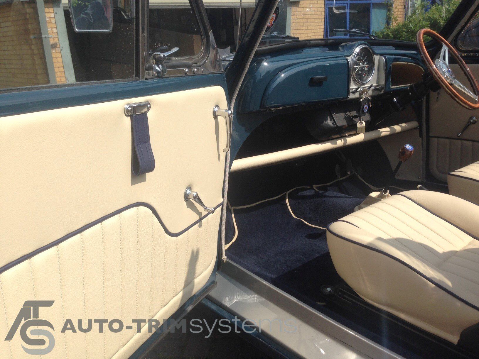 Morris Minor cabriolet door cards with custom cream leather and blue piping