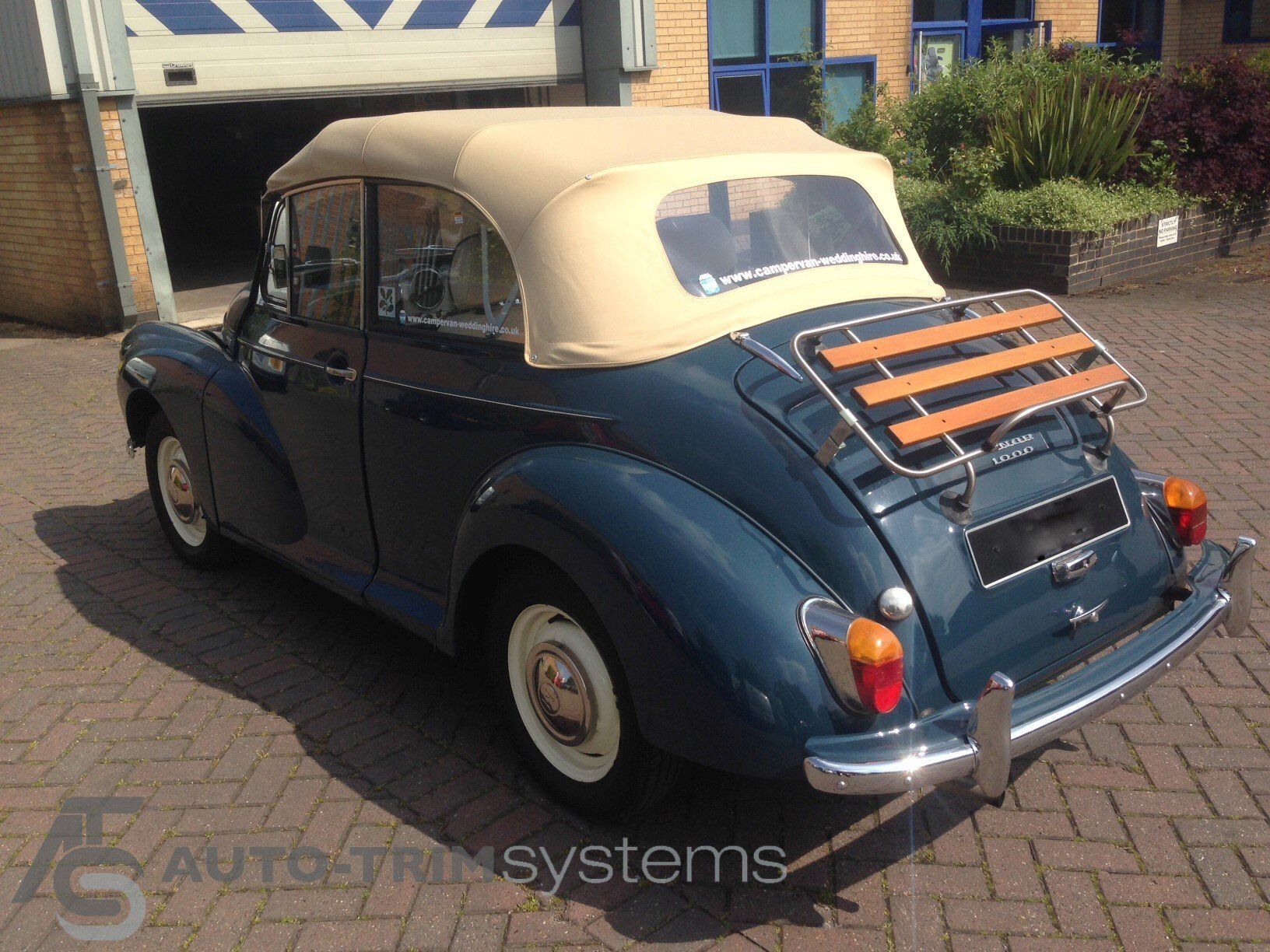 Morris Minor cabriolet with beige fitted roof