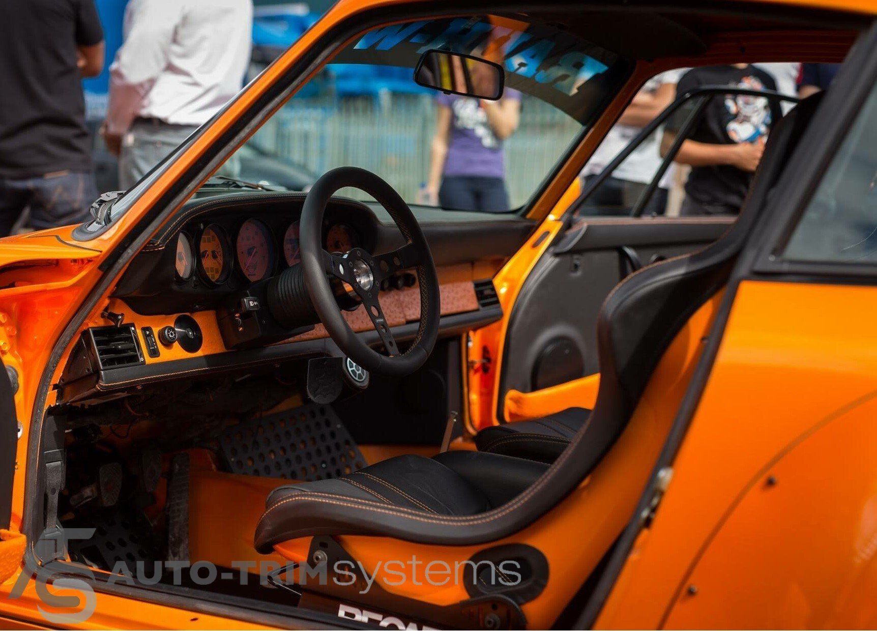 RWB Porsche with Recaro Pole Position seats in black leather with orange detailing