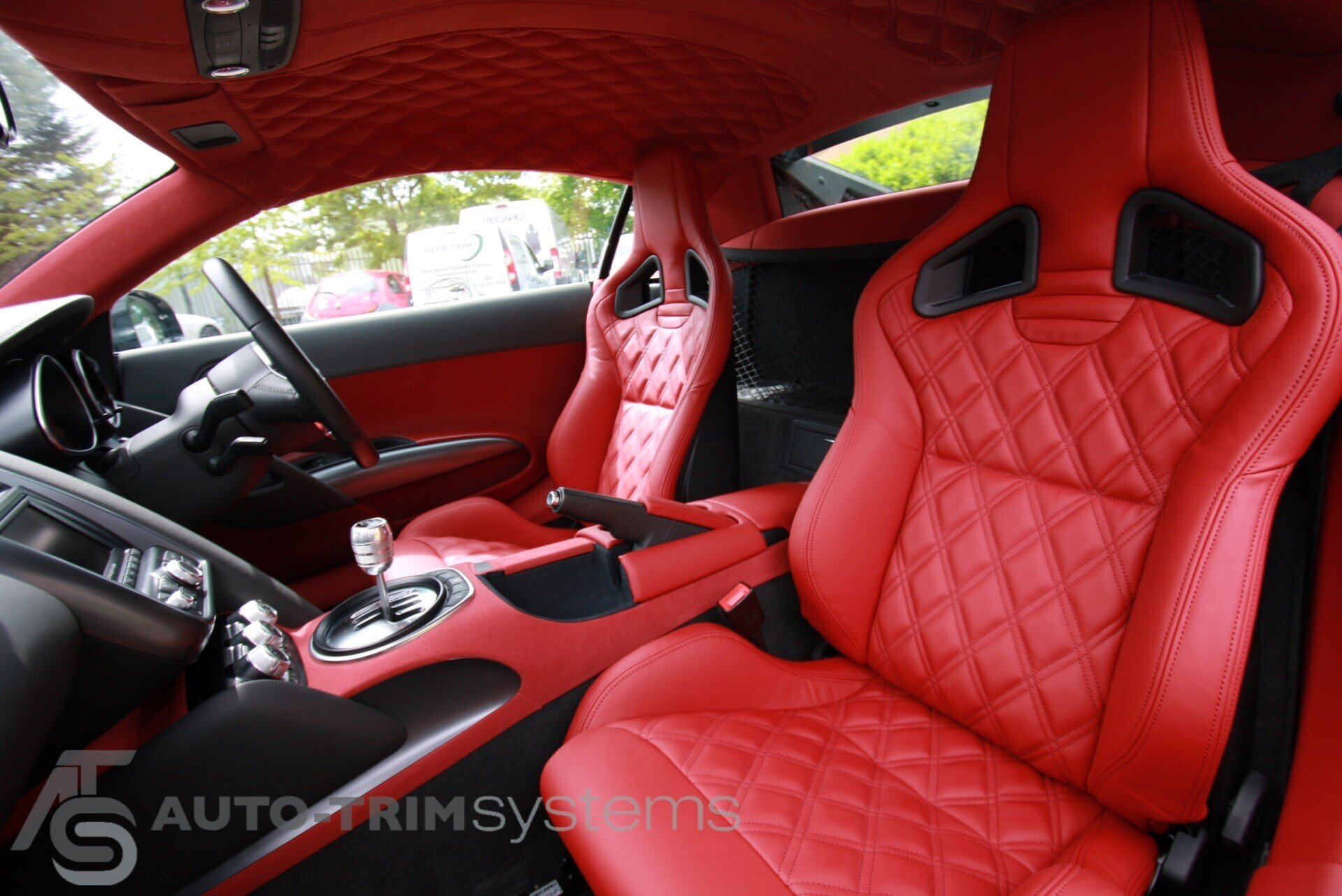 Recaro seats in red leather upholstery with diamond stitching in Audi R8