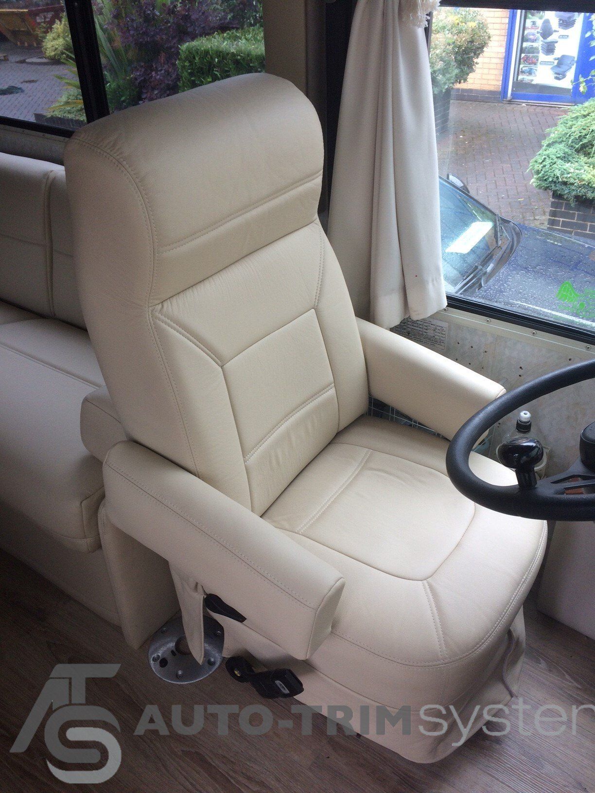 Winnebago with custom cream leather upholstered seat