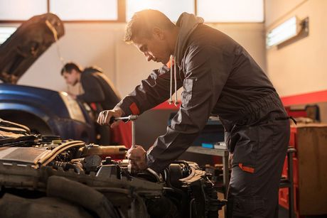 Mechanic Working on a Car Engine — Lynden, WA — Wayne’s Car Care Repair