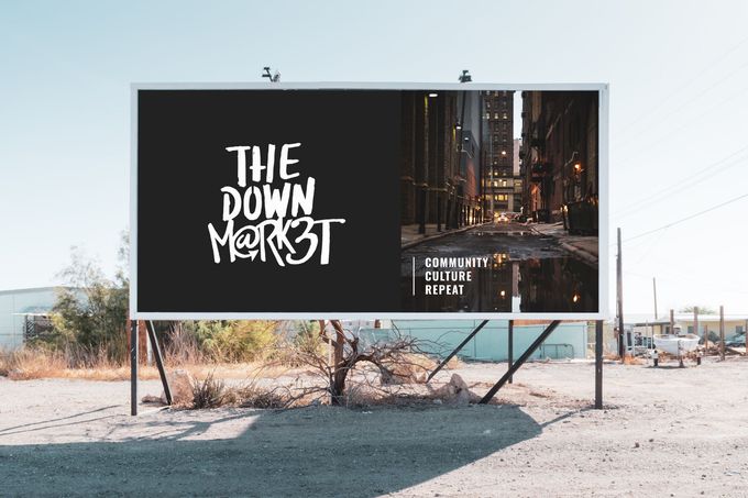 A billboard that says the down market on it