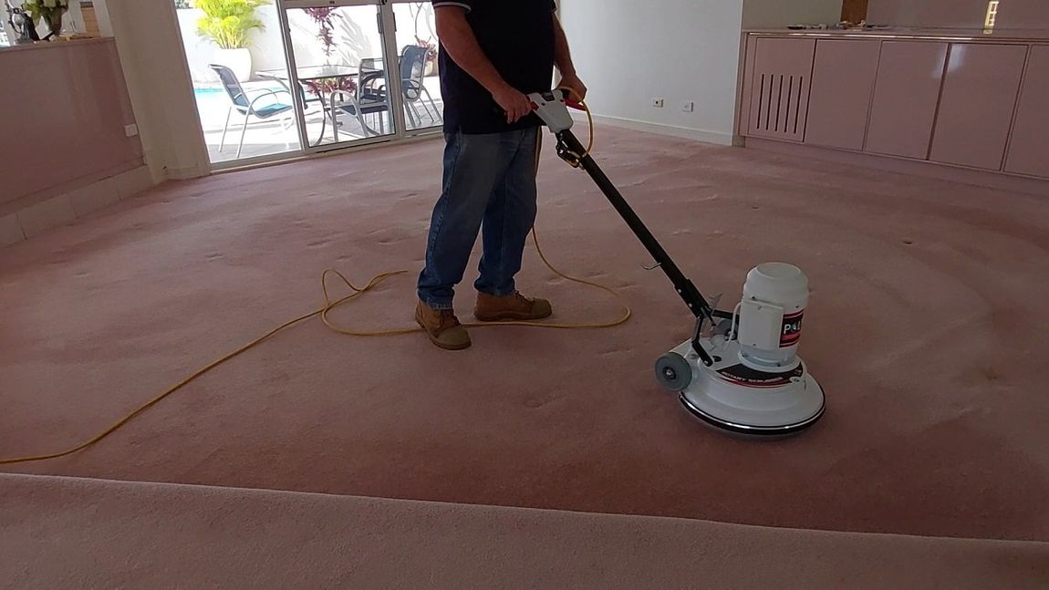 A Man Working on Carpet — Cleaning Services in Pimpama, QLD