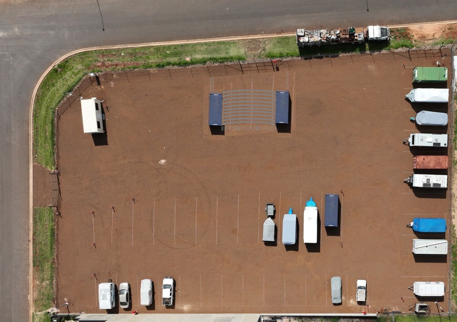 Four Large Gray Industrial Garage Doors — Tableland Self Storage In Costa Street, QLD