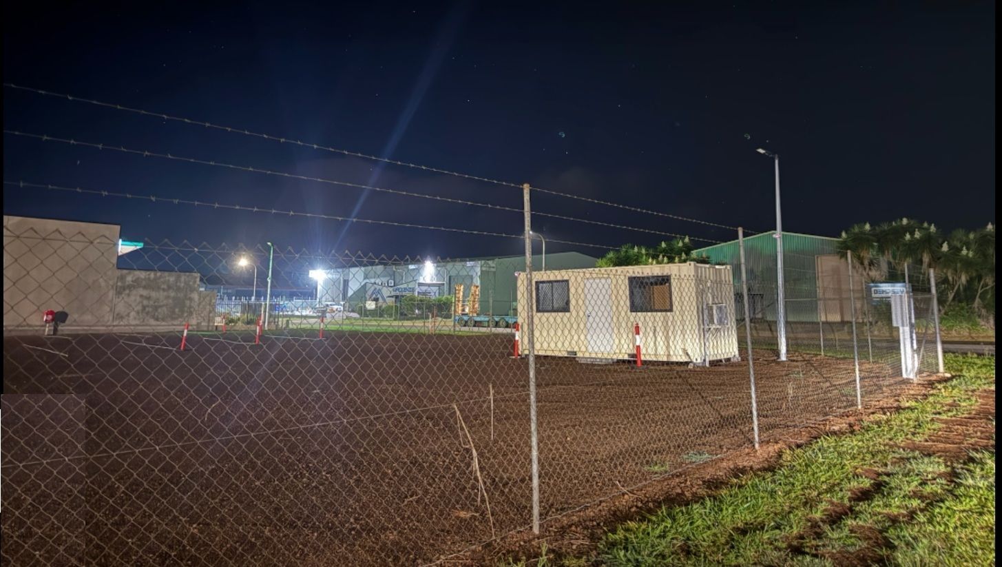 Fenced Compound at Night With Modular Buildings — Tableland Self Storage In Atherton, QLD