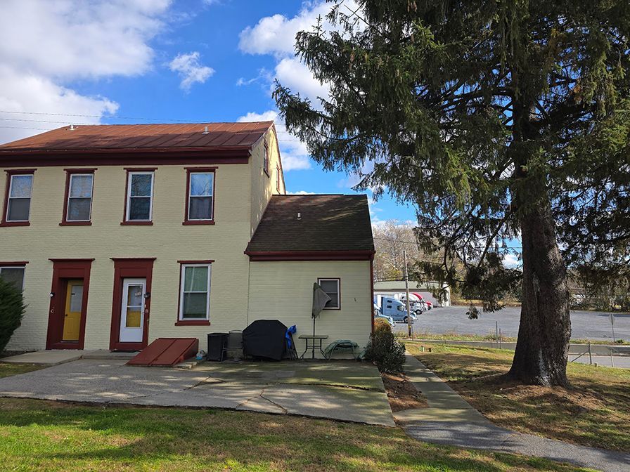 After trimming of tree near house.
