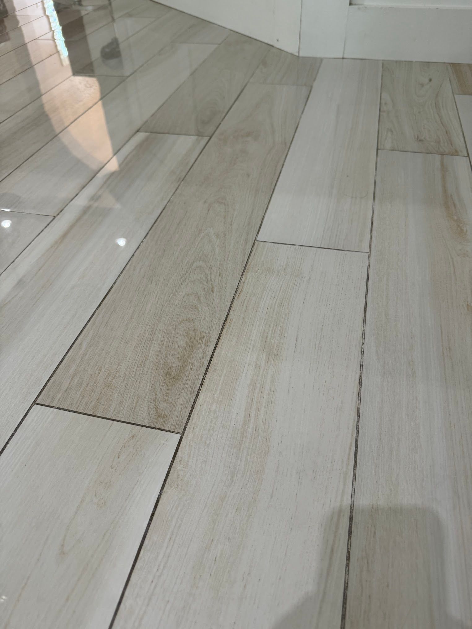 A close up of a wooden floor in a room