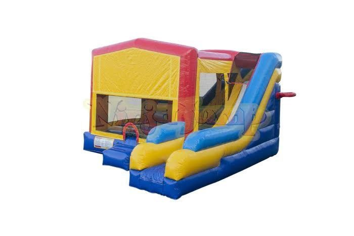 A colorful bouncy house with a slide attached to it on a white background.