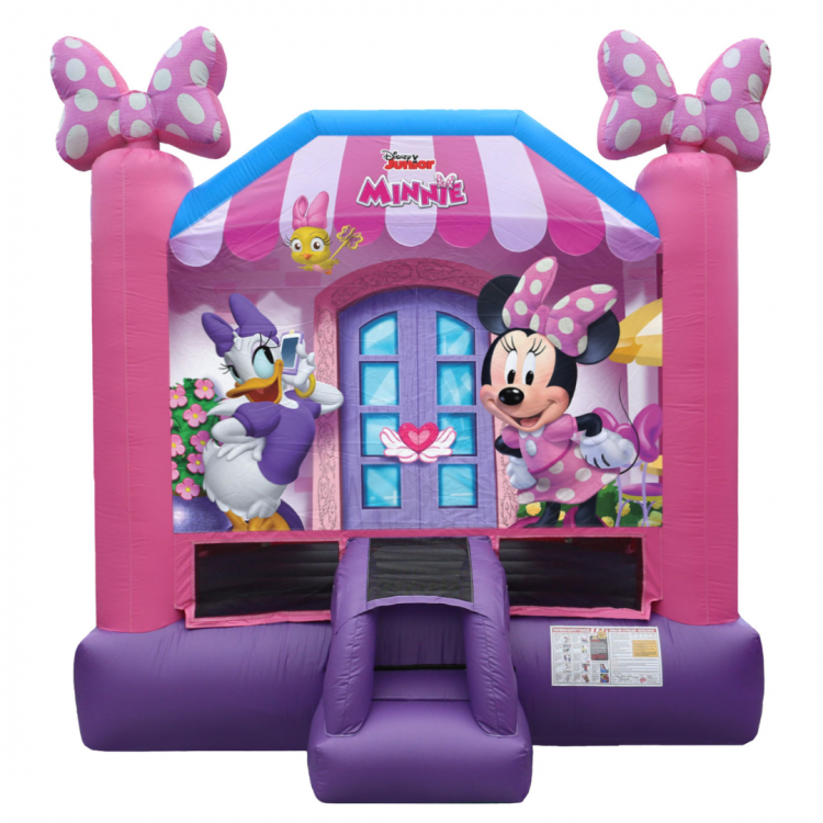 A pink and purple bouncy house with minnie mouse and daisy duck on it