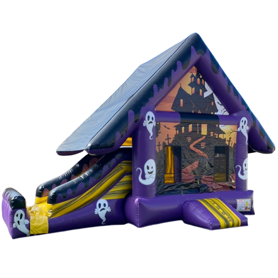 A purple bouncy house with ghosts on it
