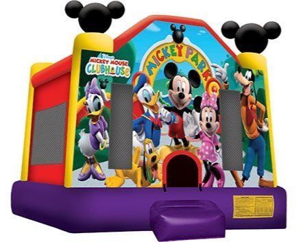 A bouncy house with mickey mouse and friends on it
