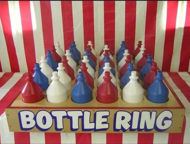 A bottle ring game with red white and blue bottles