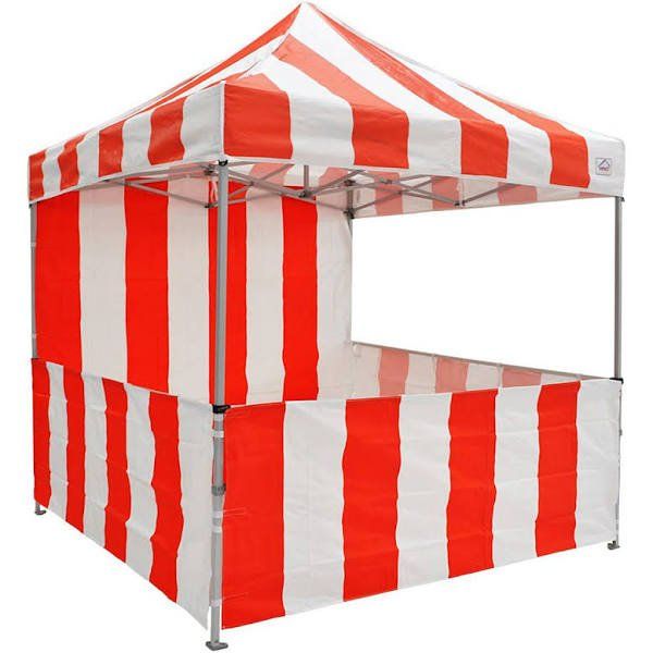 A red and white striped tent on a white background
