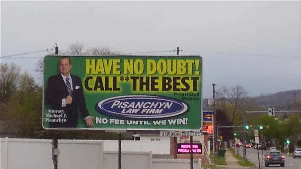 A Billboard With a Man in a Suit - Pennsylvania, PA - Outdoor Advertising Association of Pennsylvania