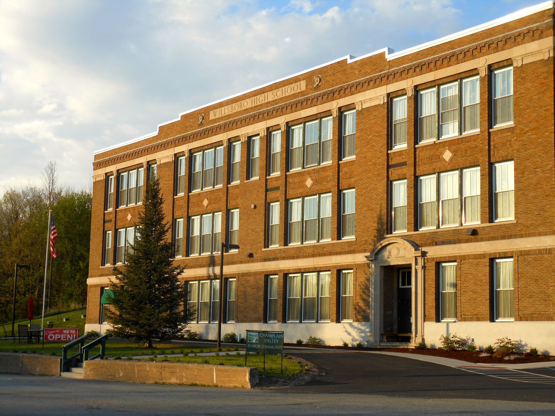 A large brick building with a lot of windows