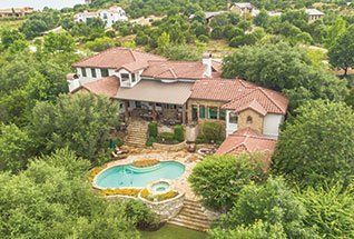 Aerial View of Back Exterior and Backyard