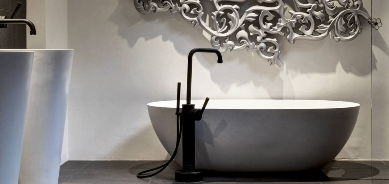 Collection pour la salle de bains : Baignoire ovoïde en ilot en résine solid surface avec vasque et robinetterie