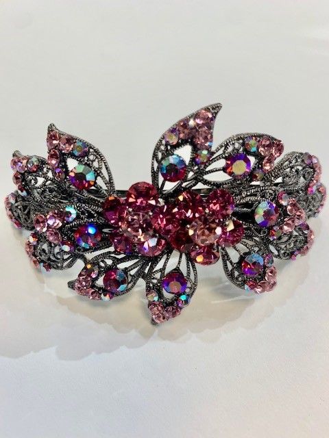 A Hair Clip With Pink Rhinestones — Roseville, CA — Love Your Hair Wigs