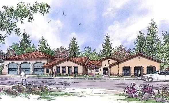 Rendering of a fire station with several garage bays, tile roof, and landscaping, against a blue sky.