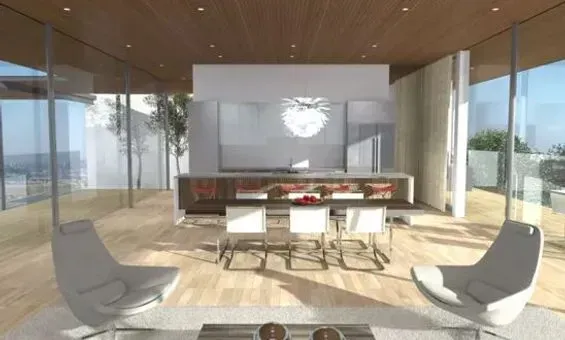 Modern living room with glass walls, wooden floors, and mid-century modern furniture.