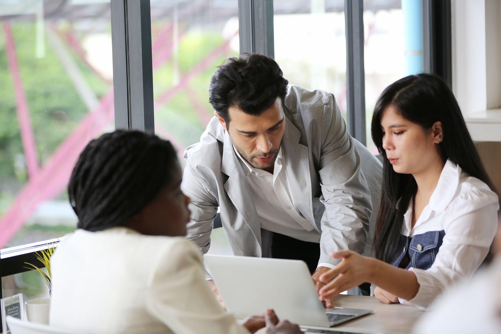 employees looking at a computer