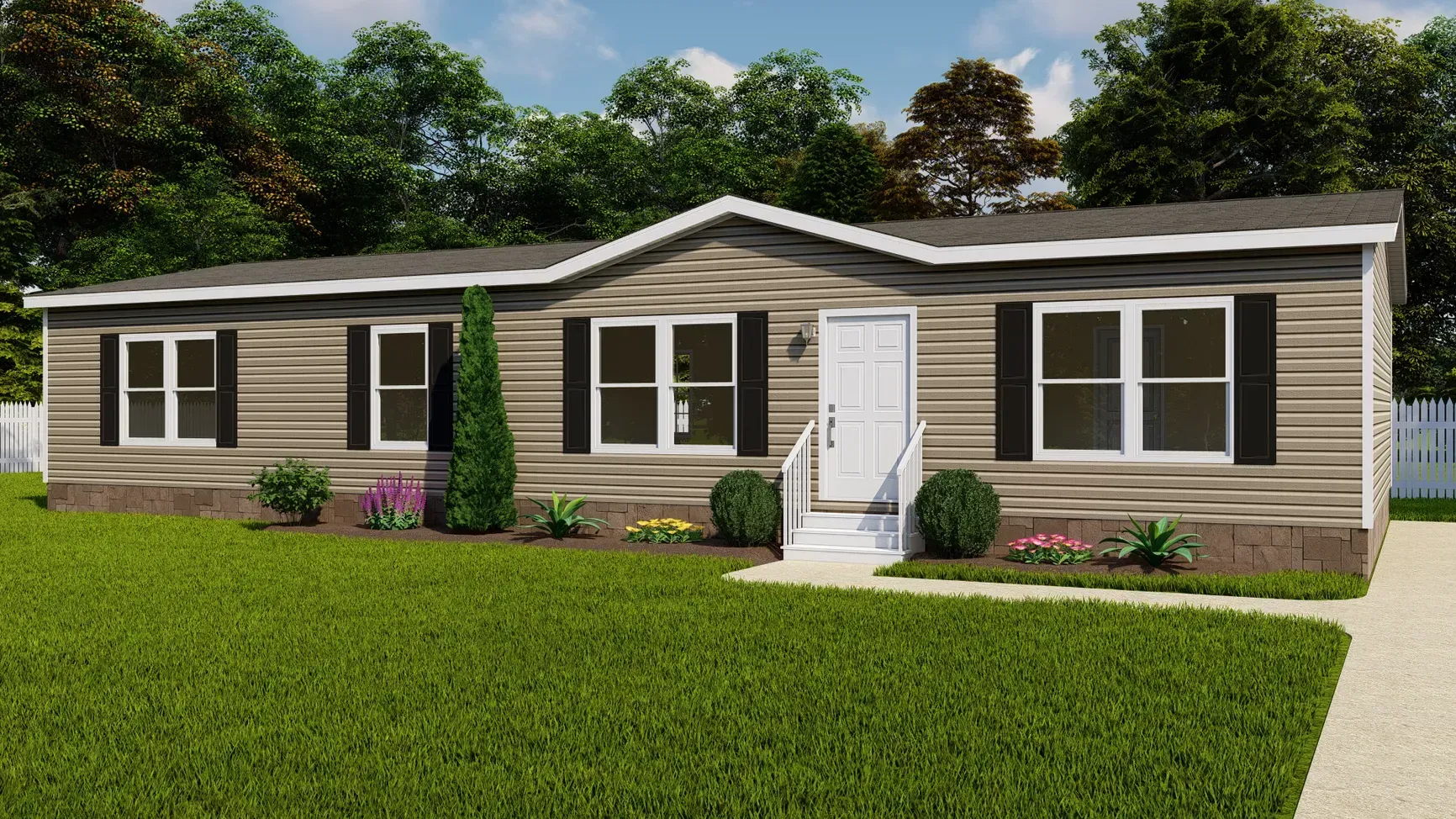 A large mobile home with a lot of new windows and shutters is sitting on top of a lush green lawn.